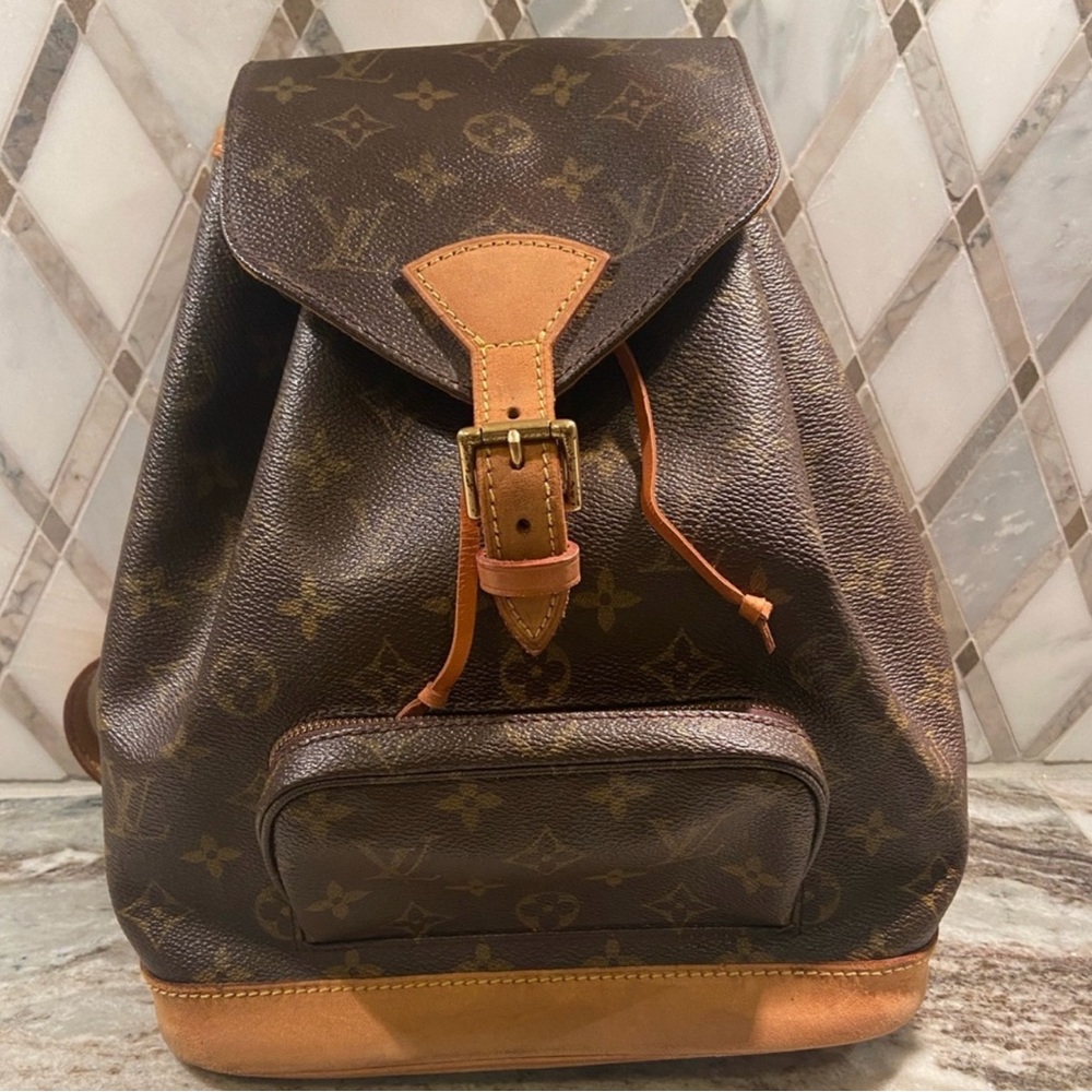 Authentic LV backpack                    Reposhing and willing to trade as well.